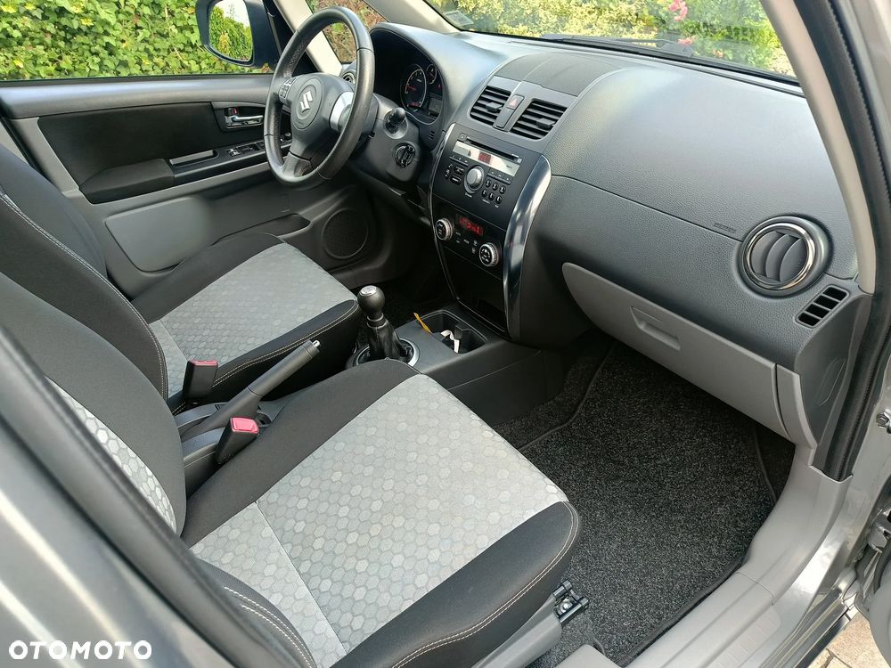 Suzuki SX4 1.6 Comfort Plus - 18