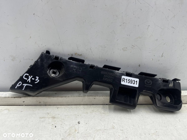 Ślizg Mazda CX-3 CX3 14-21r. prawe tylne mocowanie wspornik uchwyt zderzaka prawy tył d10j502h1