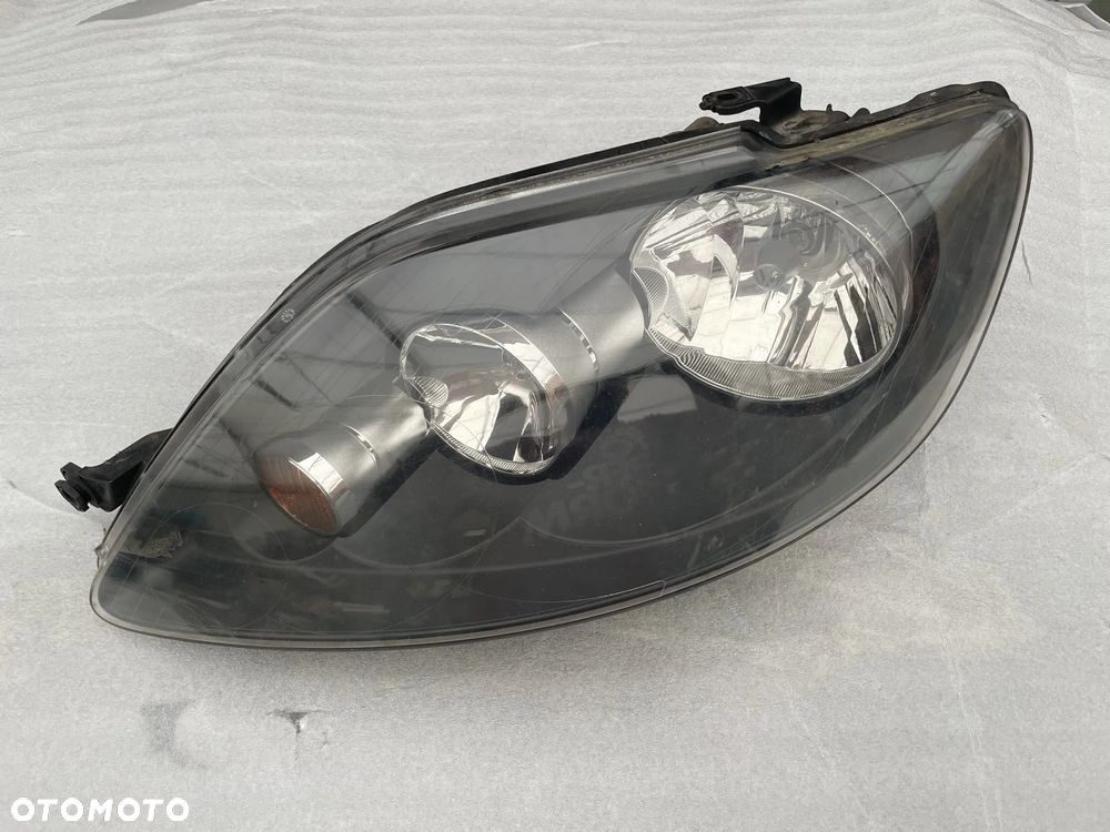 VW Golf V Plus reflektor lewy lampa przód - 1