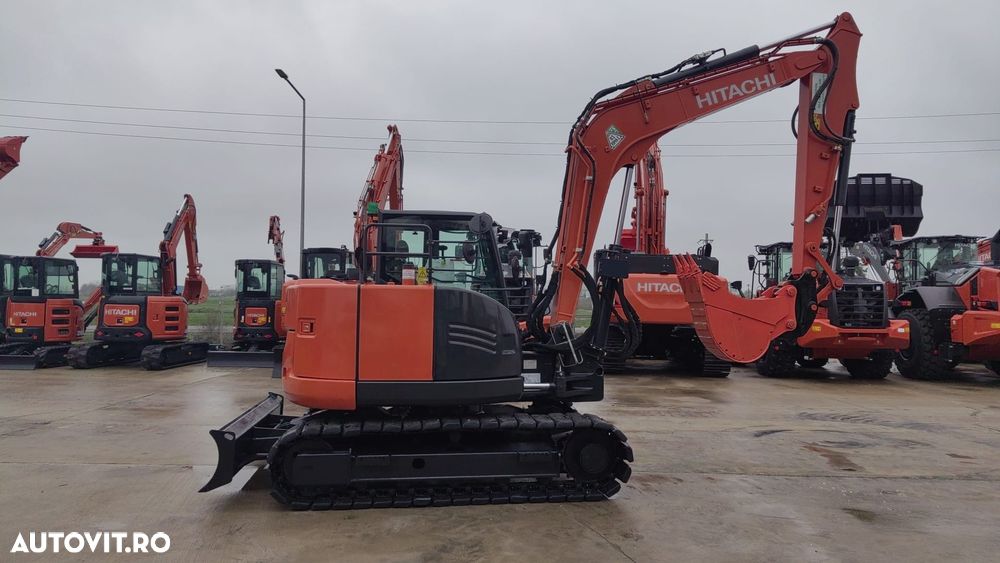 Hitachi ZX85, 2023, 2.314h, MASA OPERATIONALA 9,3tone, senile cauciuc pad, CUPLA RAPIDA HIDRAULICA si 3 cupe NOI, latime 2,2m, ad sapare 5m, inst picon pe brate, Aer cond, camera spate, posibil leasing 4 ani, CA NOU-PROMOTIE 63900 EUR+tva - 25