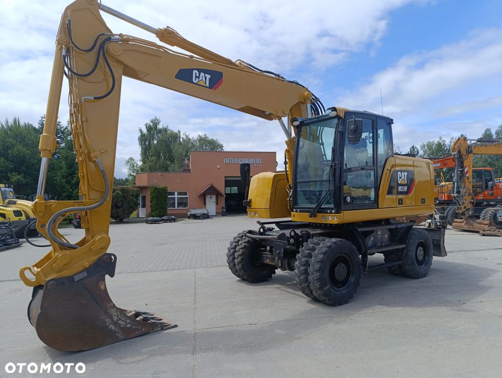Caterpillar M318 - 5