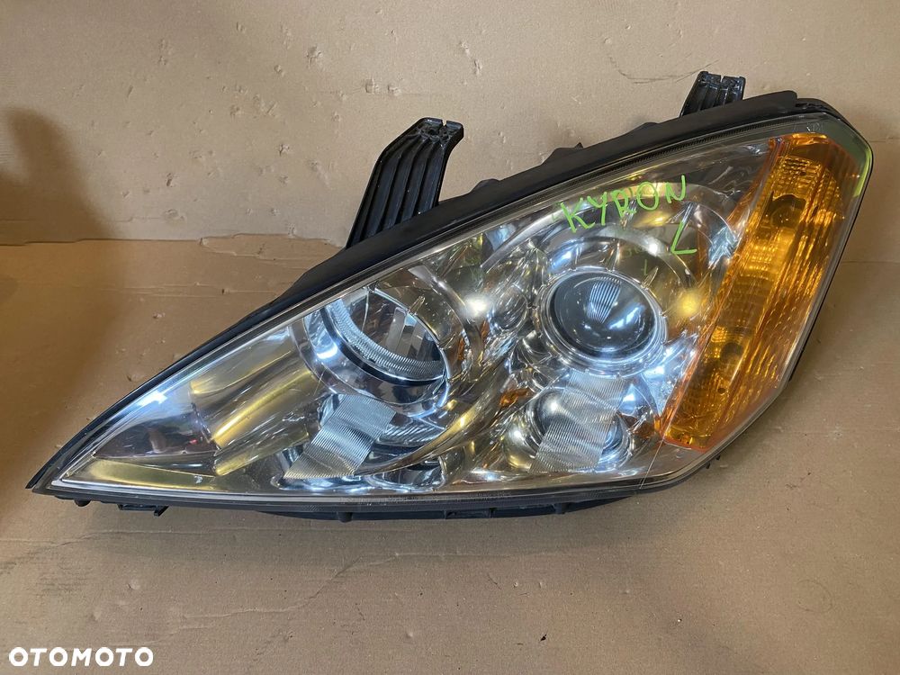 Lampa SsangYong Kyron lewa lewy przód OE - 1