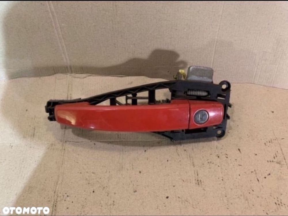 Klamka zewnętrzna drzwi lewa opel corsa d 2006-2014