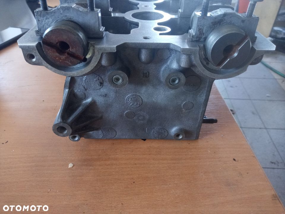głowica astra zafira b 1.6 16v z16xe1 55559597 - 4