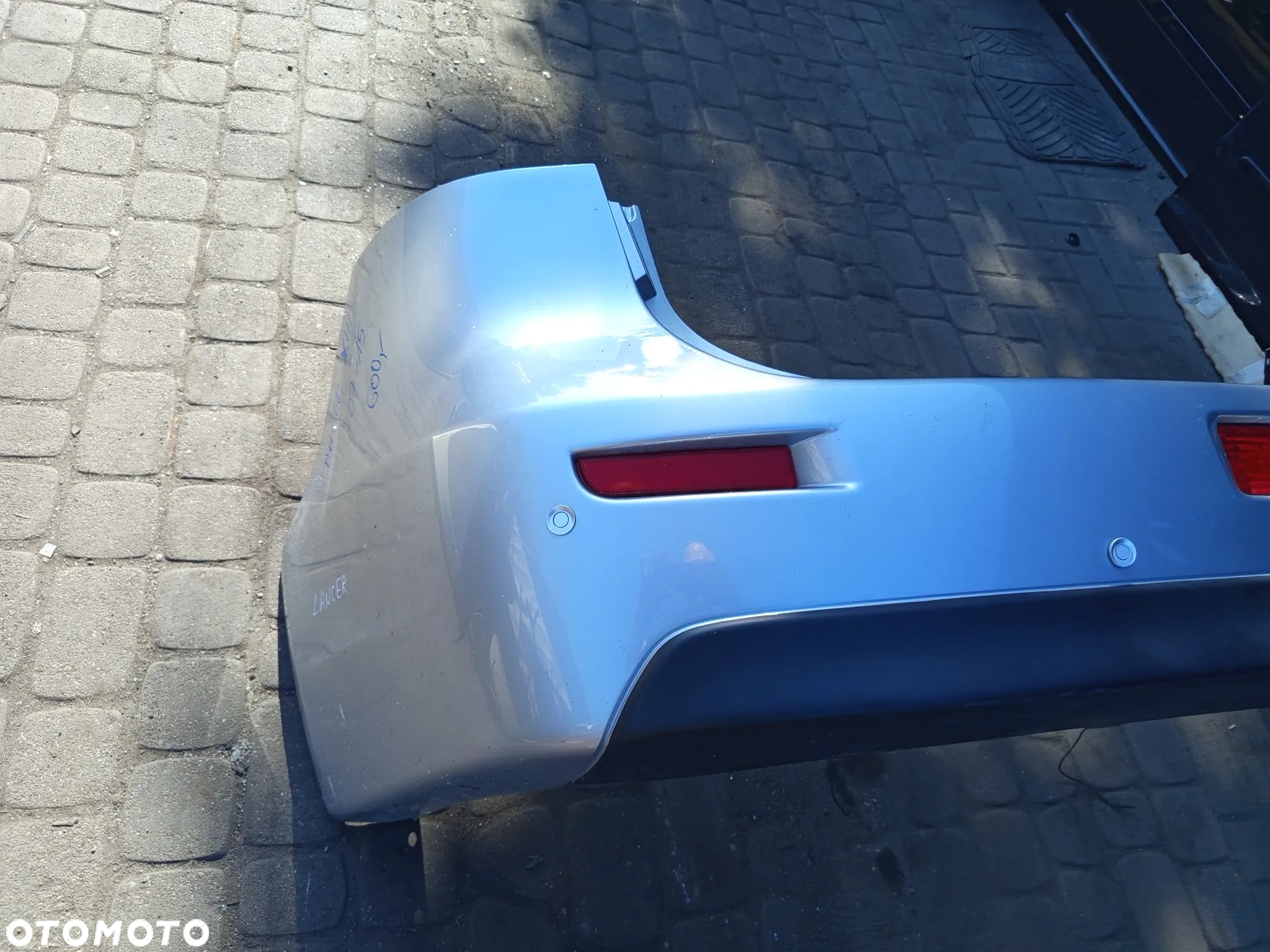ZDERZAK TYLNY MITSUBISHI LANCER 07-15 5-DRZWI - 2