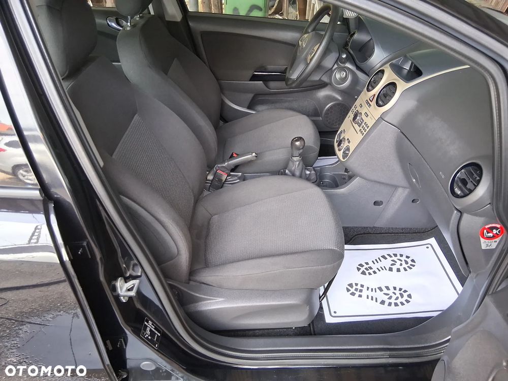 Opel Corsa 1.2 16V Enjoy - 11
