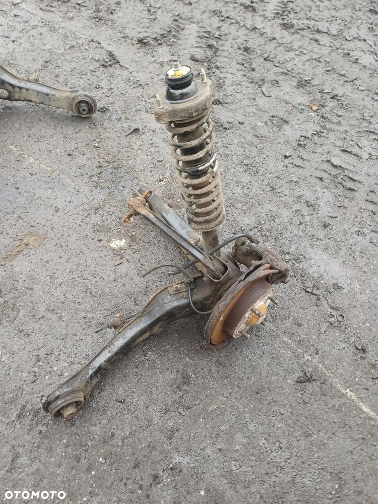 Wahacz tylny lewy prawy 1.8 gdi Mitsubishi Carisma 2003r lift 4G93 - 1