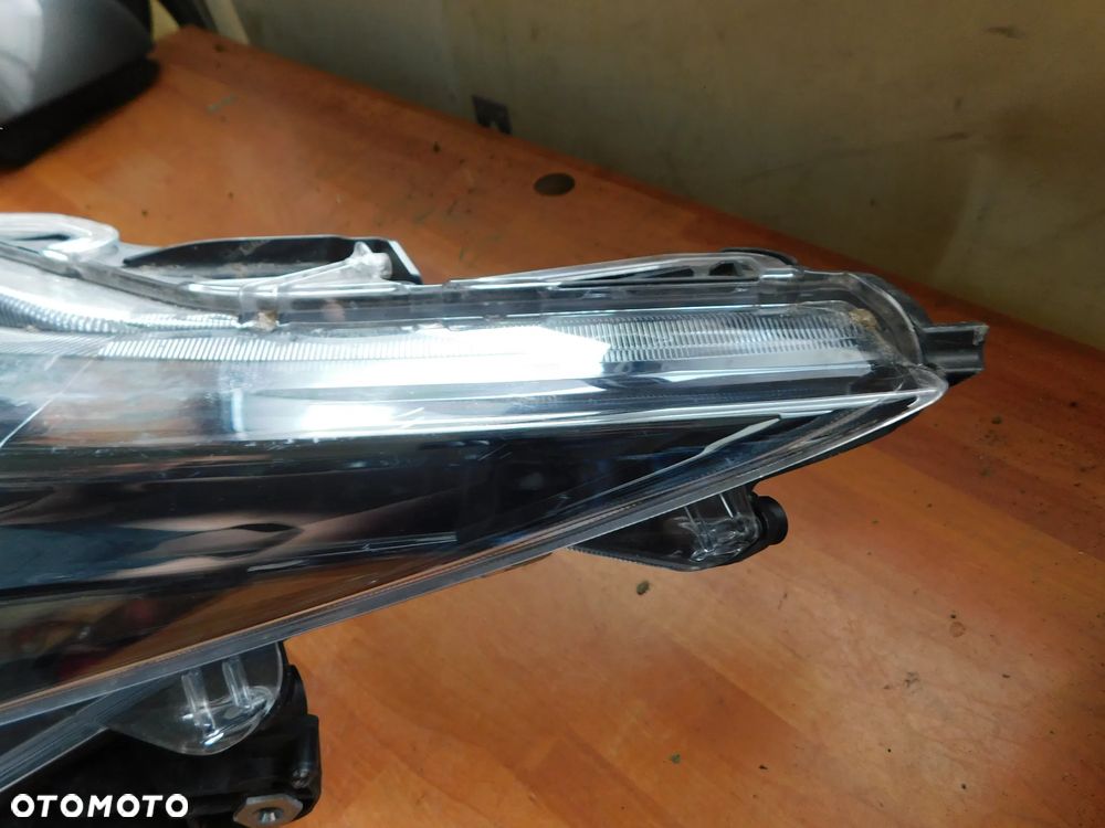 lampa lewa przód TOYOTA COROLLA E21 EU - 4