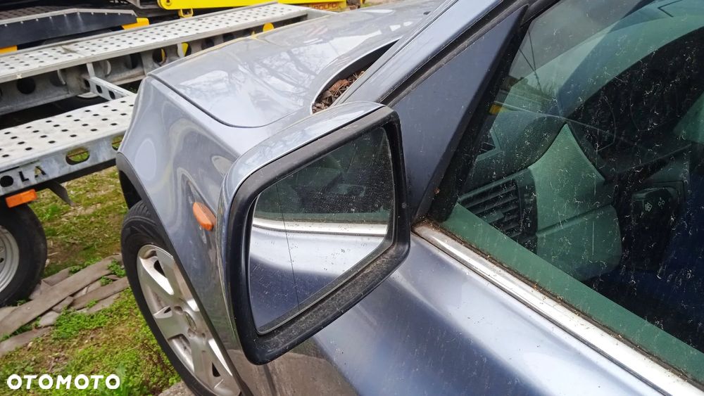 Lusterko lewe prawe zewnętrzne BMW X3 E83 Bluewater metallic - 5