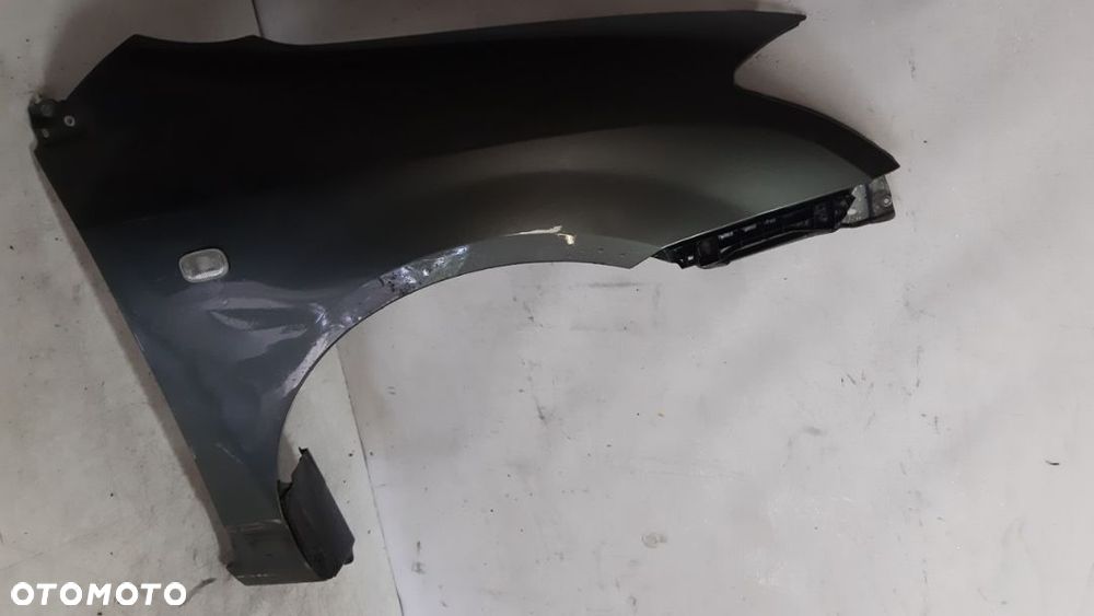 * TOYOTA COROLLA E12  BŁOTNIK PRZÓD PRAWY 1G3 - 2