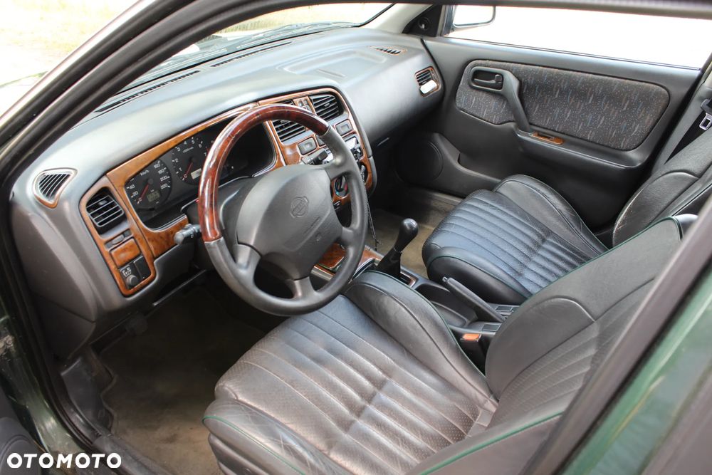 Nissan Primera 2.0 SGX - 13