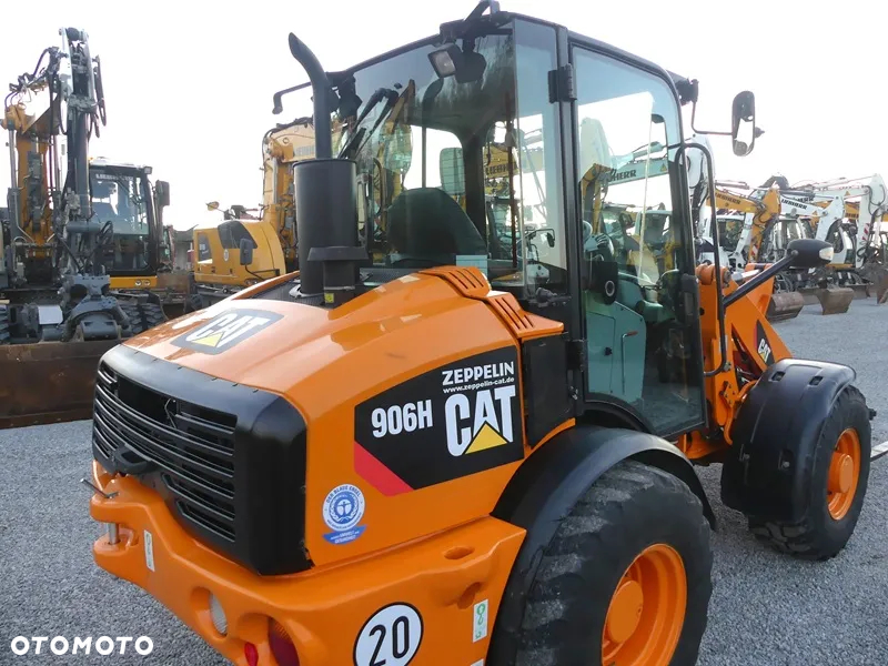 Caterpillar CAT 906H / Z Niemiec / 6424mtg / - 17