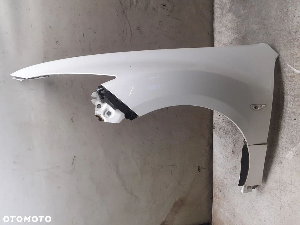 * Błotnik PRZEDNI PRZÓD  LEWY MAZDA  6 II KOLOR 34K BIAŁY