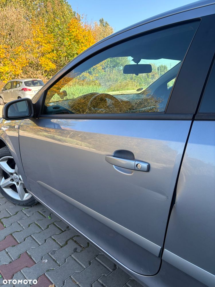 Opel Astra 1.8 Sport - 10