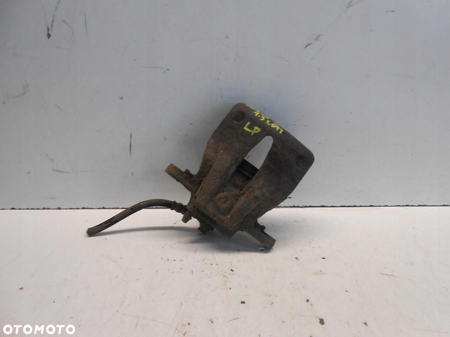 ZACISK HAMULCOWY LEWY PRZÓD OPEL CORSA C 1.3 CDTI # - 1