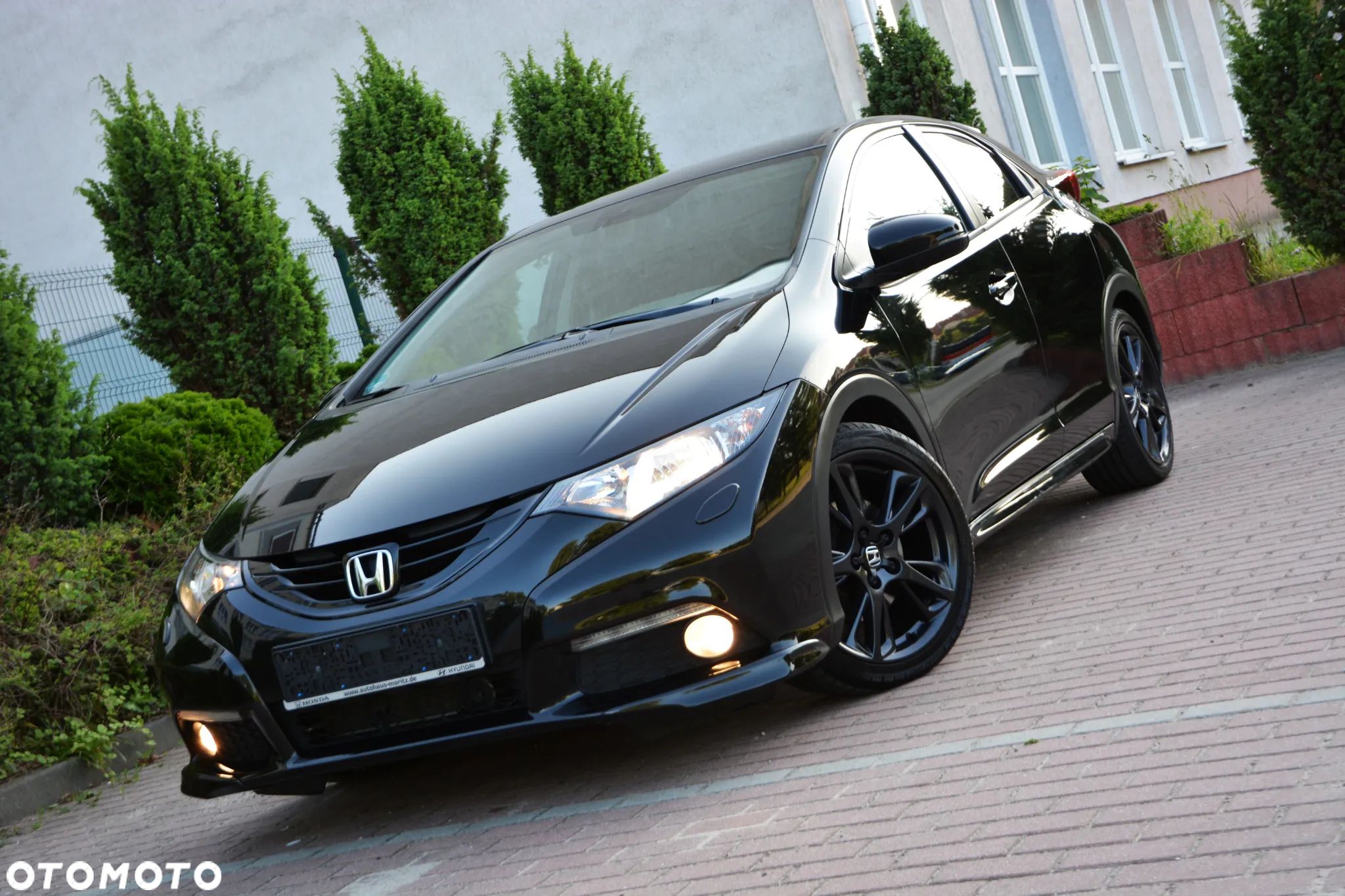 Honda Civic 1.8 i-VTEC Comfort Black Edition - 1