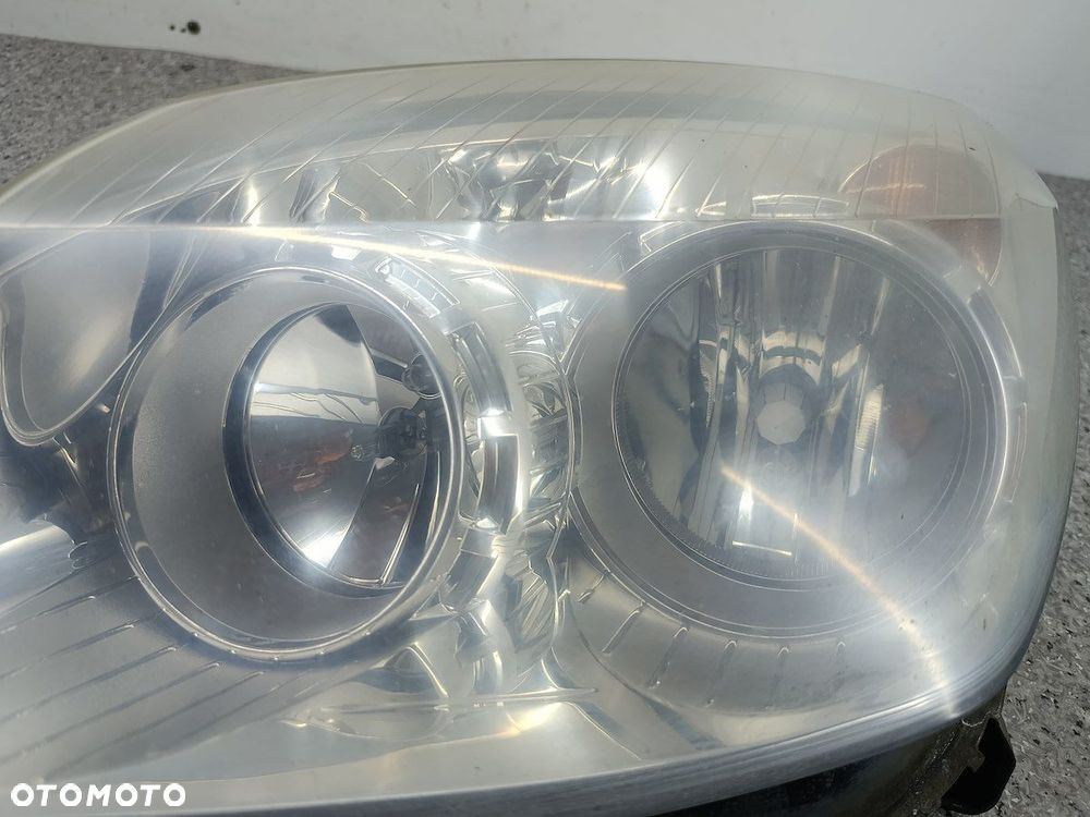 LAMPA PRZÓD LEWA OPEL ASTRA H 13239288 1EG270370-41  HELLA - 3