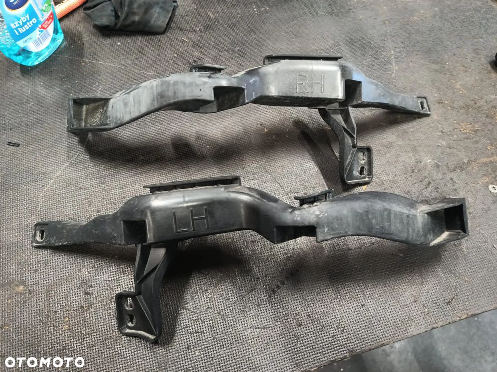 OPEL ASTRA V K ŚLIZG LAMPY PRAWY LUB LEWY PRZÓD - 1