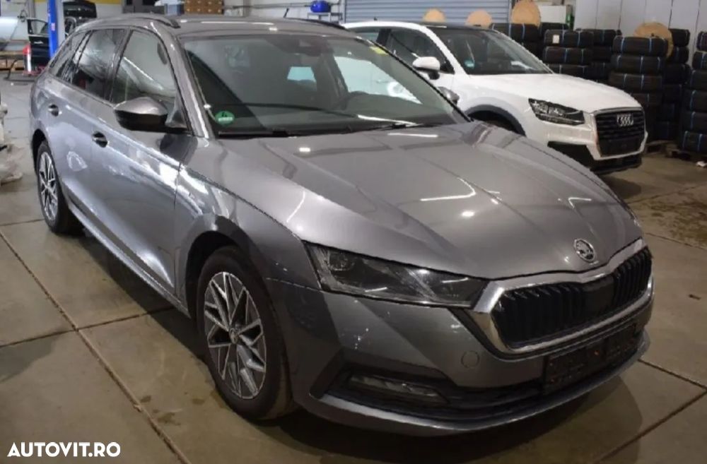 Skoda Octavia Combi 2.0 TDI DSG Tour - 1