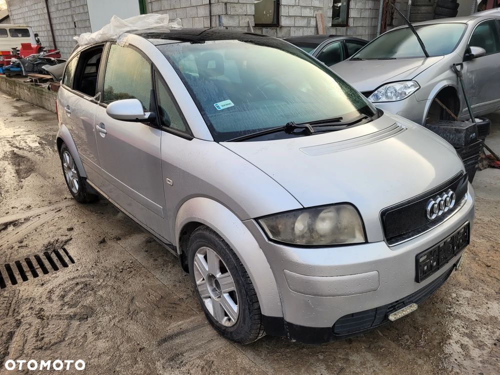 audi a2 fotel kanapa deska kokpit podsufitka boczek podłokietnik licznik panel szyb stacyjka - 1