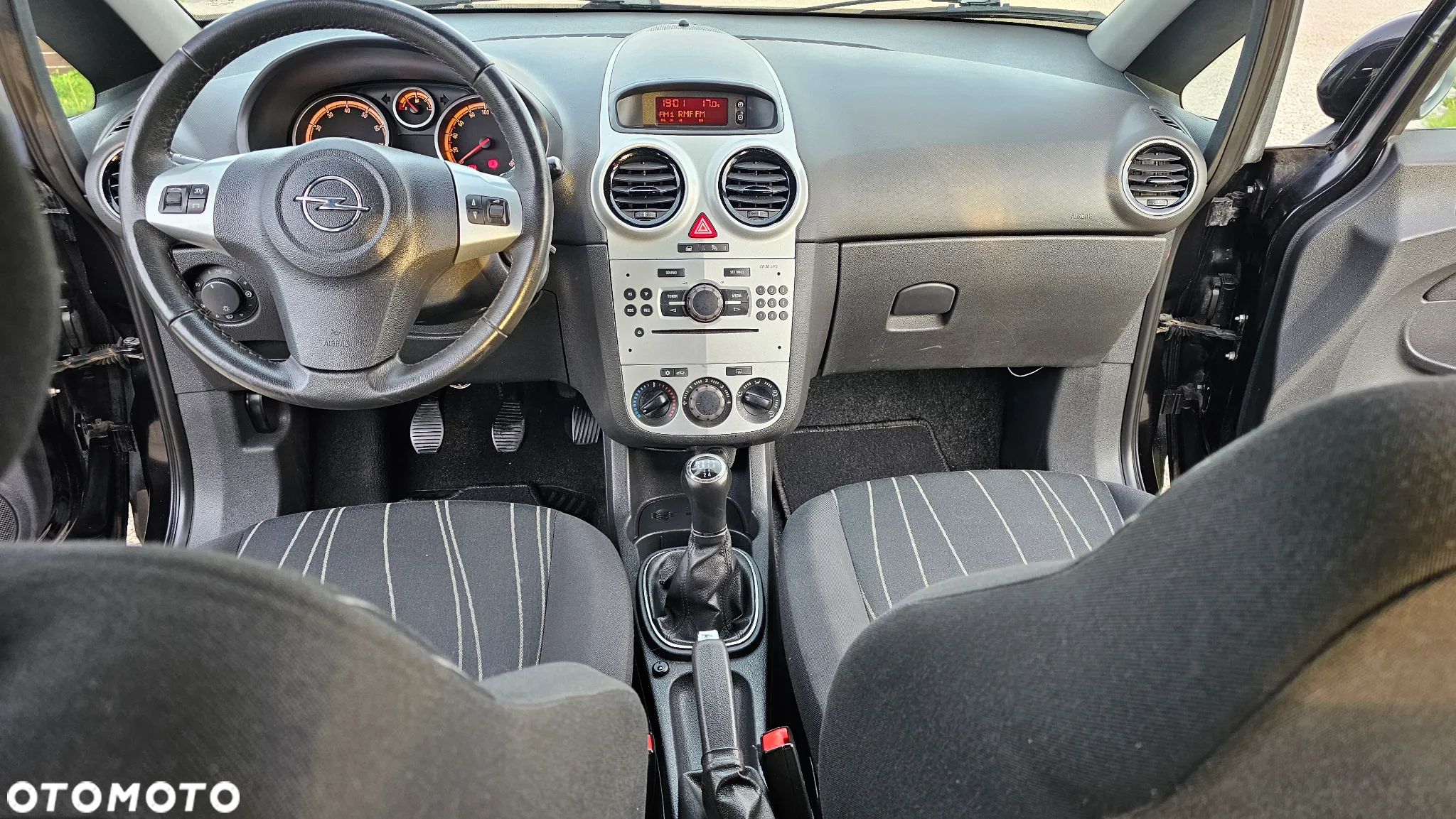 Opel Corsa 1.2 16V Enjoy - 11