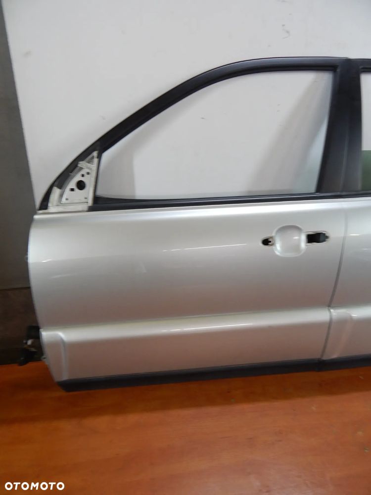 Drzwi lewy przód Kia Sportage II 04-10 srebrny 9S  Łuków części
