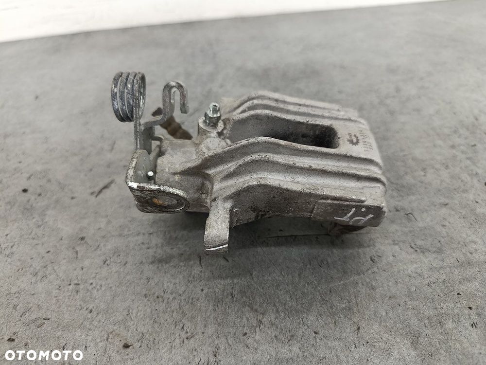 ZACISK HAMULCOWY PRAWY TYŁ AUDI A4 B6 23SKV324 SKV 1.9 TDI - 4