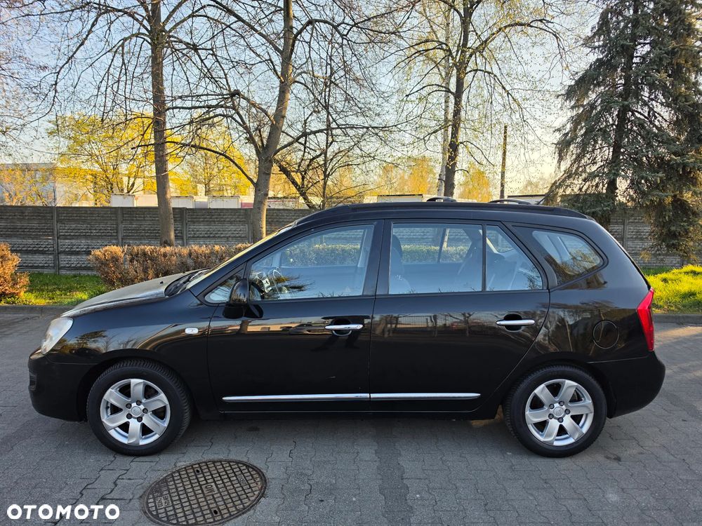 Kia Carens - 4