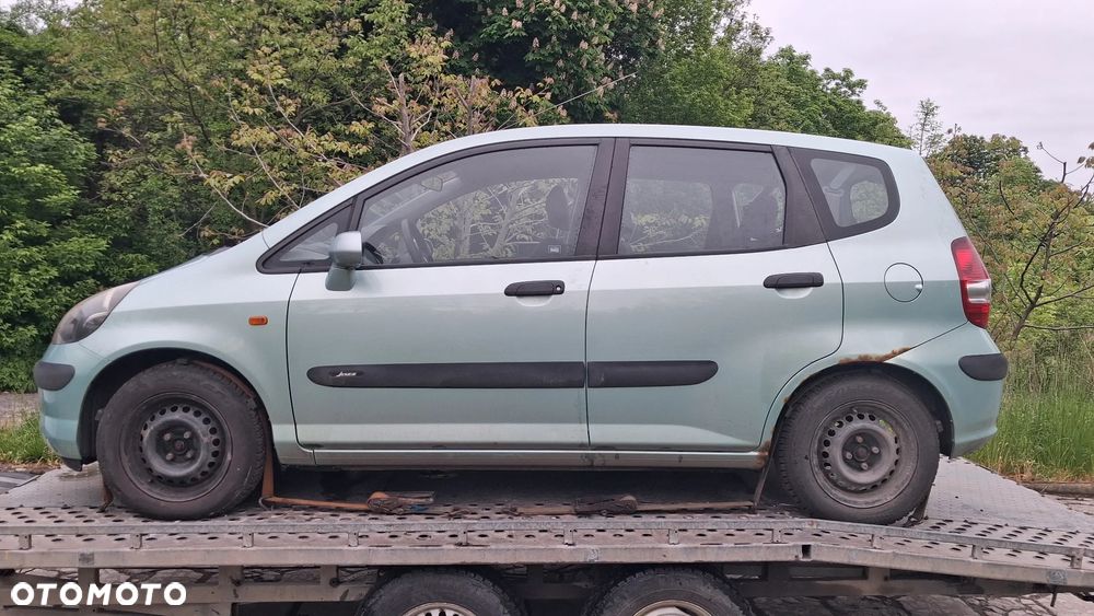 Na części Honda Jazz II Silnik 1.3 83KM L13A1 lakier G506M skrzynia automatyczna CVT maska zderzak drzwi klapa szyba fotel kanapa lusterko lampa deska GWARANCJA !!! Przód Tył Zestaw Komplet Drzwi Klapa Zderzak Błotnik Maska Grill Atrapa Szyba Pas Lampa Lusterko Boczki Fotel Kanapa Kokpit Deska Rozdzielcza Przełącznik Włącznik Sterownik Przewody Wiązka Instalacja Moduł Komputer Czujnik Listwa Pompa Alternator Wtryski Głowica Rozrusznik Kompresor Sprzęgło Dwumas Silnik Skrzynia ABS Klimatyzacji Paliwa Wspomagania Kolektor Turbina Przepustnica Zawór Chłodnica Koło Hak Belka Sanki Zawieszenie Mcpherson Półoś Amortyzator Wydech Tłumik Zacisk - 8