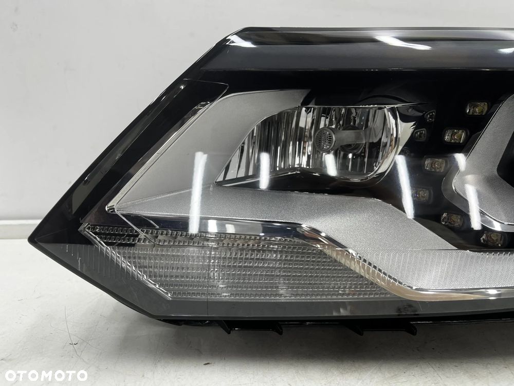 Lampa reflektor VW Tiguan 1 I 5n LIFT 10-16r. lewa przednia XENON EU skrętna doświetlanie zakrętów + - 4