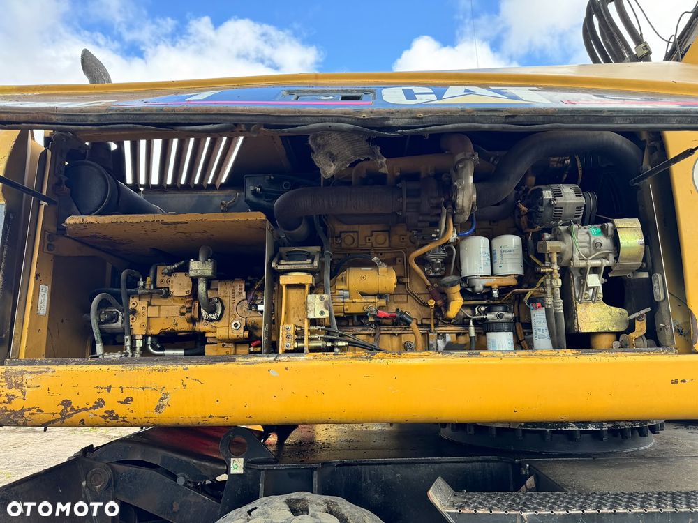 Caterpillar 318C - 12