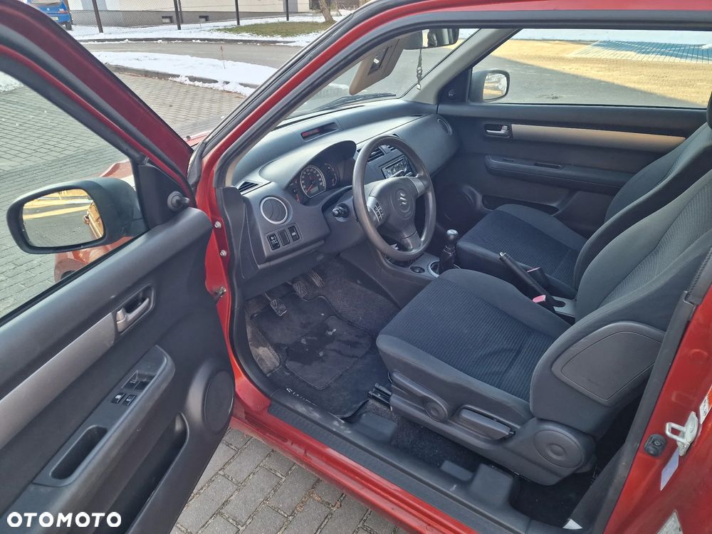 Suzuki Swift 1.3 Club - 9