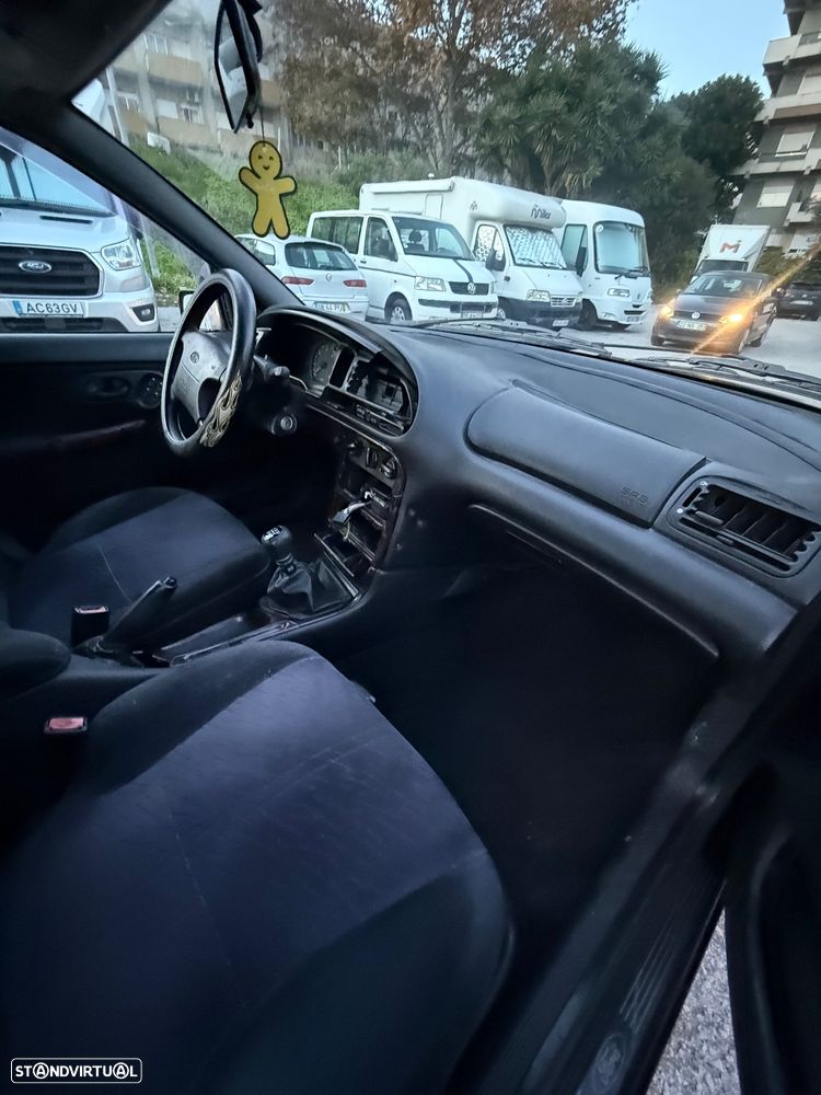 Ford Mondeo SW 1.8 TDi Ghia - 11