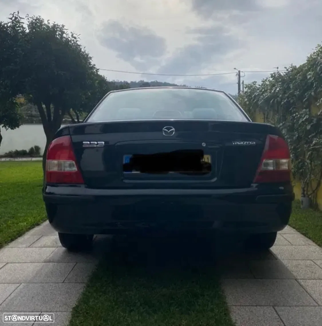 Mazda 323 - 7