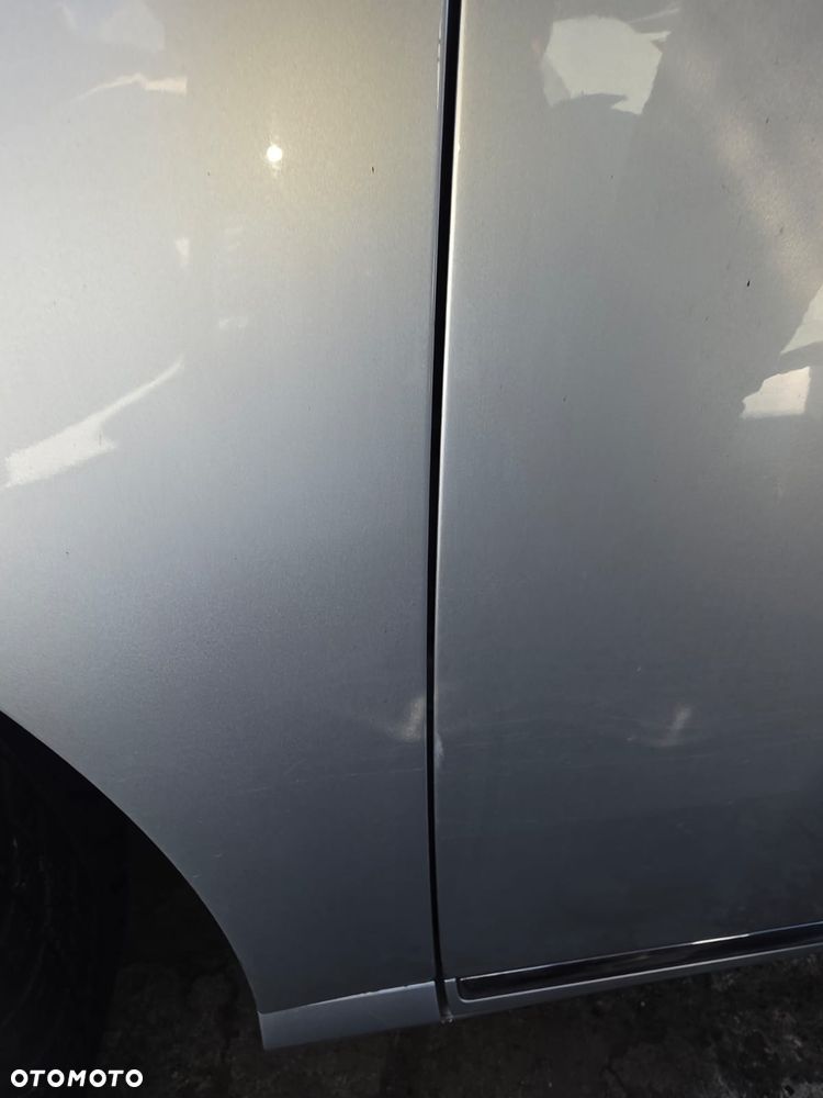 Drzwi lewy  przód  vw  Passat  b7  w  kolorze  LA7W - 3