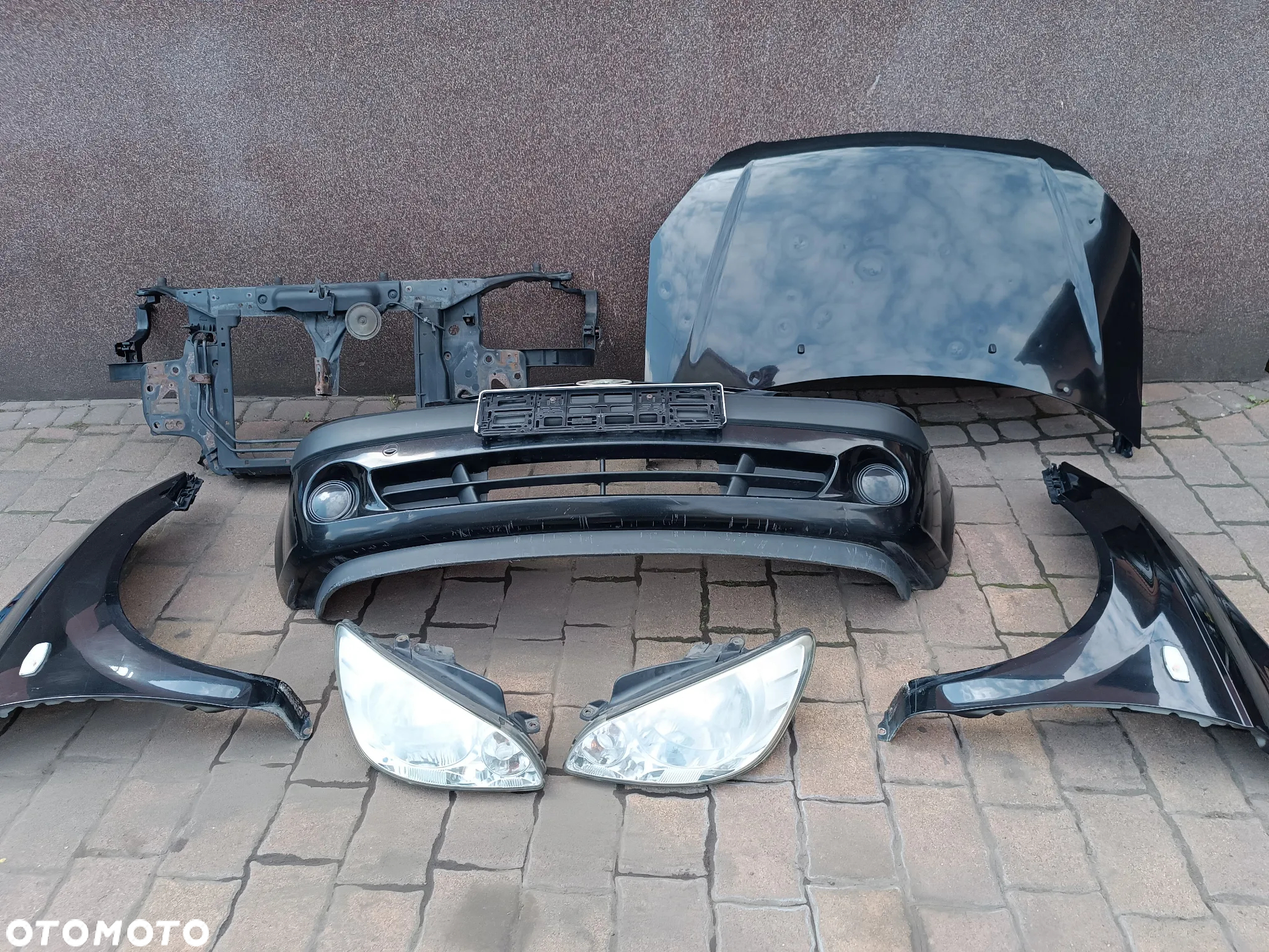Hyundai Getz FL LIFT (2006-2010) błotnik PRAWY przód przedni Czarny kod lakieru EB - 11