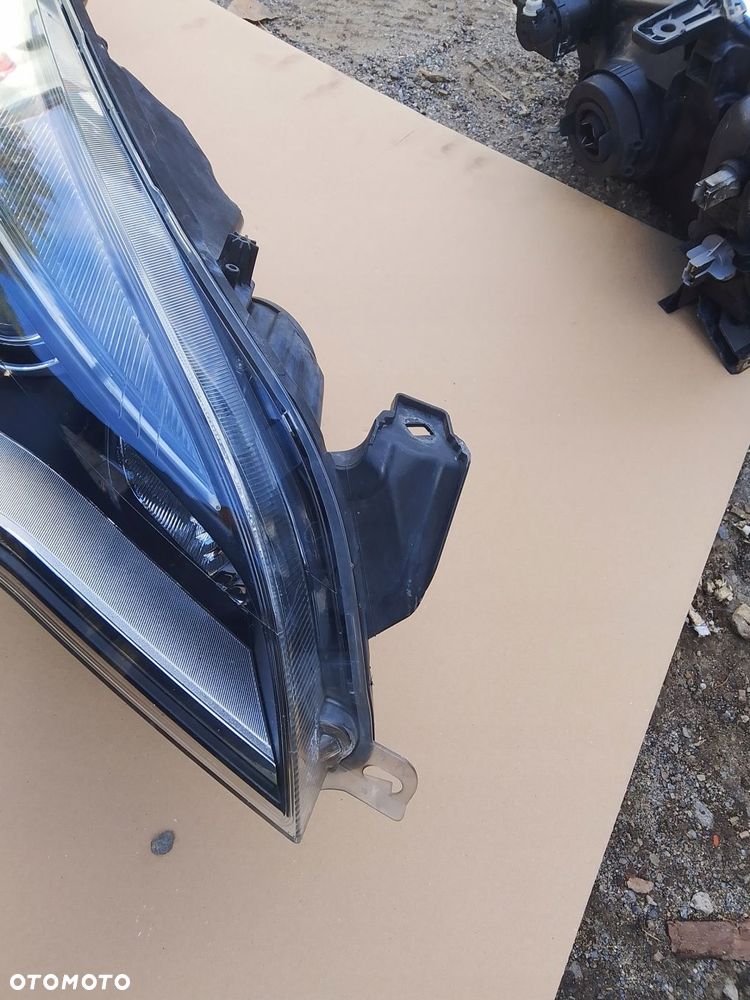 lampa prawa przód bi xenon skrętny opel astra j 13253651 - 2
