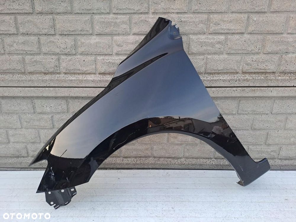 NISSAN PULSAR 2014-2023 BŁOTNIK PRZEDNI LEWY - 1