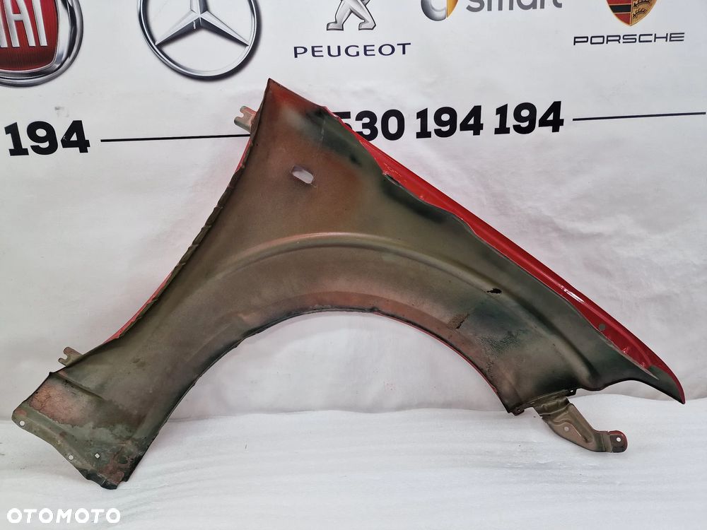 NISSAN NAVARA D40 / PATHFINDER R51 III 05- LEWY BŁOTNIK PRZEDNI PRZÓD , ŁADNY , DO MALOWANIA , NR AUKCJI BŁ122 - 16