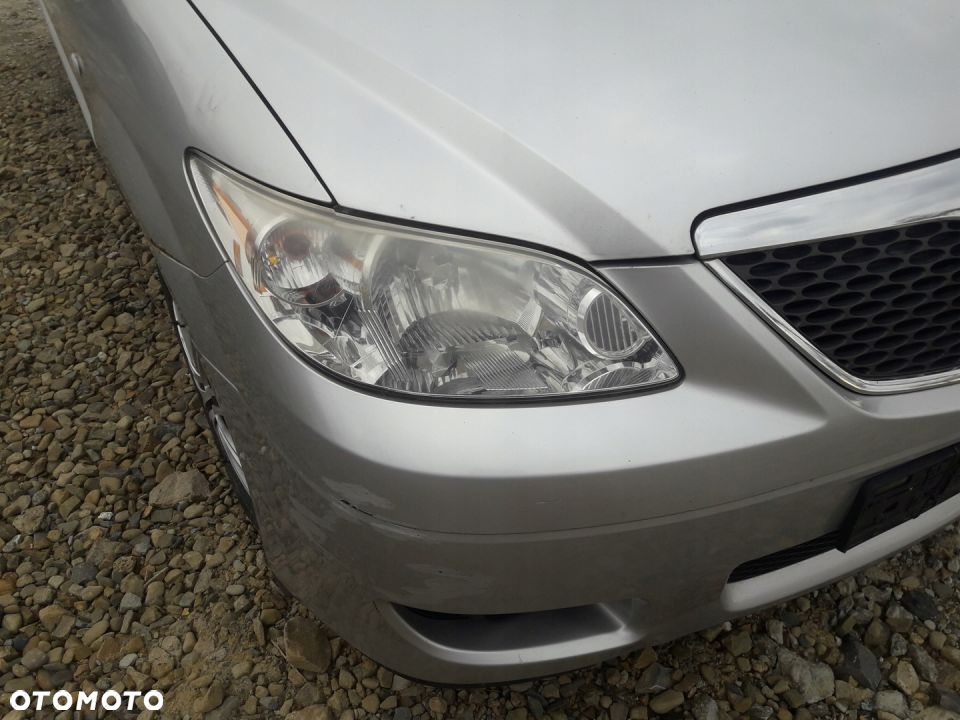 Mazda MPV 04-06 Maska lampa zderzak pas atrapa 22V - 4