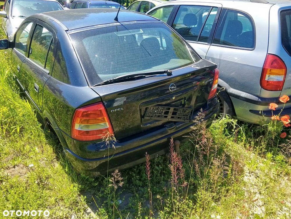 Opel Astra G (98-09r.) 1.6 B 74KM. Silnik X16SZR Skrzynia MG4 lakier 81L. Cały na części. GWARANCJA !!!  Przód Tył Zestaw Komplet Drzwi Klapa Zderzak Błotnik Maska Grill Atrapa Szyba Pas Lampa Lusterko Boczki Fotel Kanapa Kokpit Deska Rozdzielcza Przełącznik Włącznik Sterownik Przewody Wiązka Instalacja Moduł Komputer Czujnik Listwa Pompa Alternator Wtryski Głowica Rozrusznik Kompresor Sprzęgło Dwumas Silnik Skrzynia ABS Klimatyzacji Paliwa Wspomagania Kolektor Turbina Przepustnica Zawór Chłodnica Koło Hak Belka Sanki Zawieszenie Mcpherson Półoś Amortyzator Wydech Tłumik Zacisk Most - 3