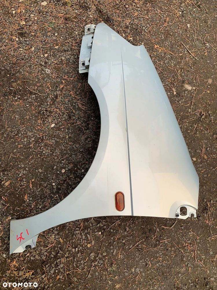 BŁOTNIK LEWY PRZÓD RENAULT SCENIC I LIFT NV632 - 1