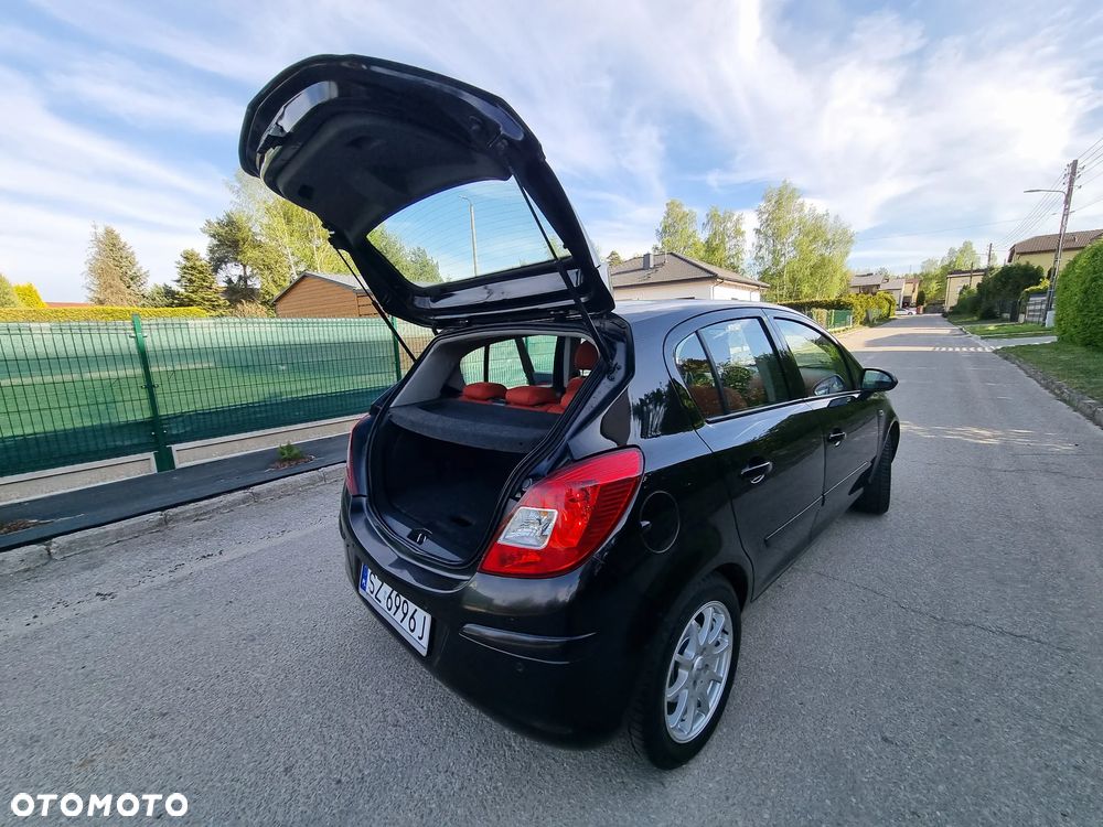 Opel Corsa 1.4 16V Cosmo - 32
