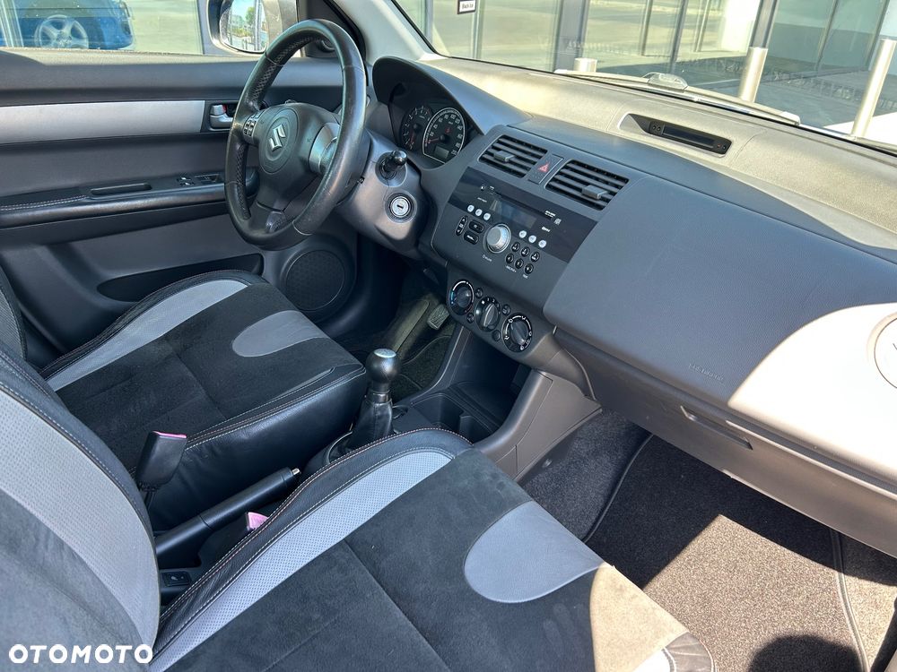 Suzuki Swift 1.3 Club - 8