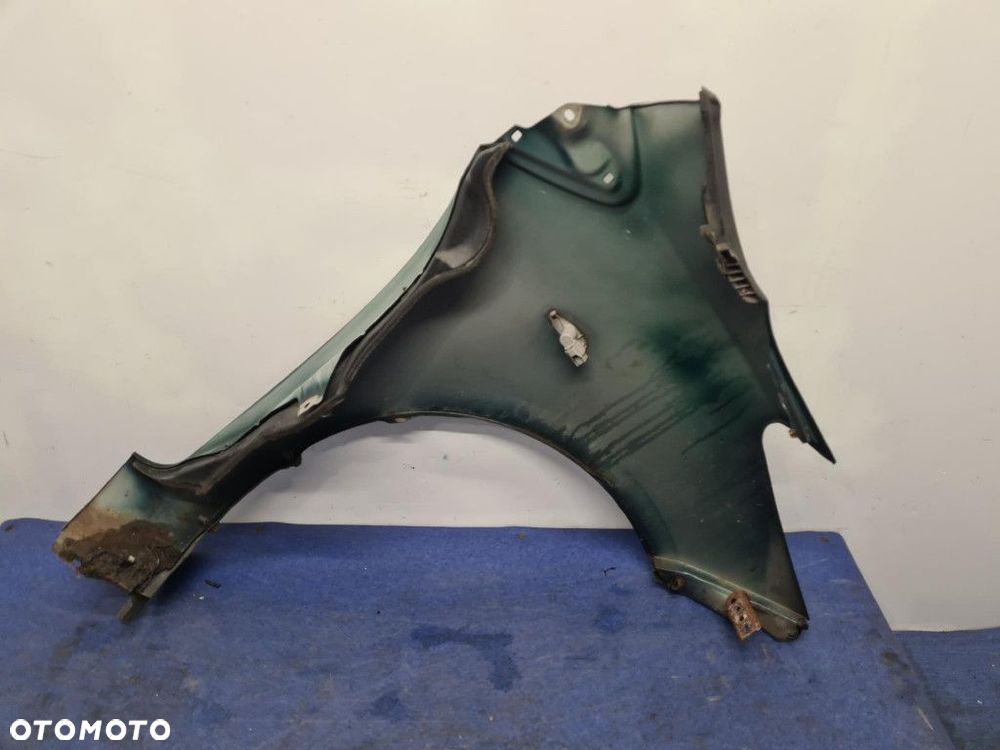 TOYOTA YARIS II LIFT BŁOTNIK PRZÓD LEWY 6S3 - 8