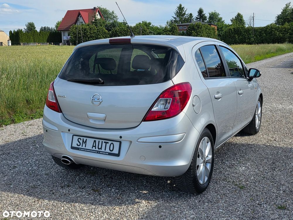 Opel Corsa 1.4 16V Cosmo - 7