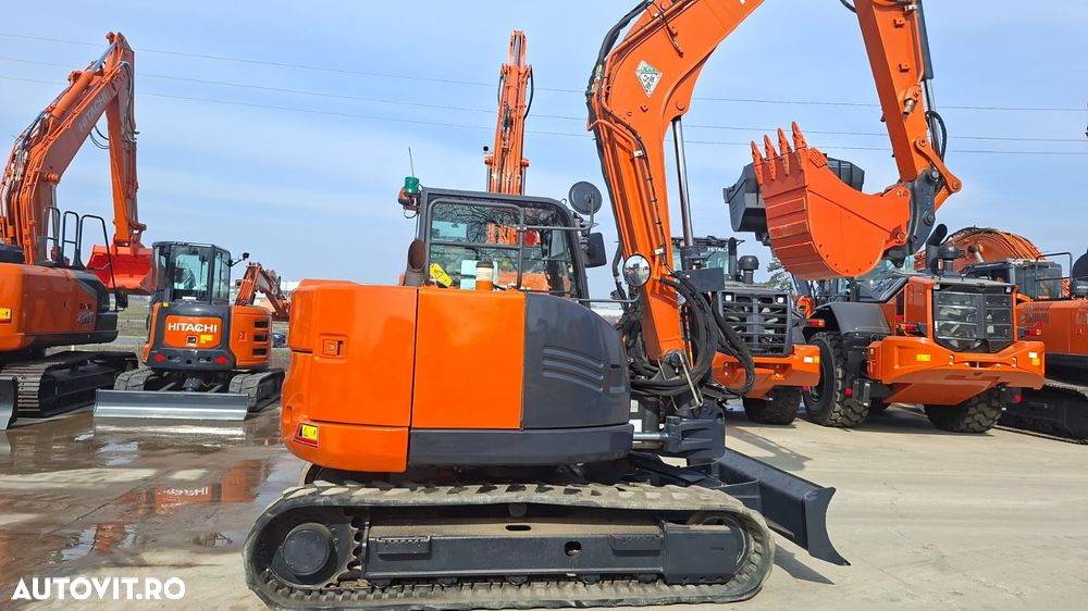 Hitachi ZX85, 2022, 3.339h, CUPLA RAPIDA HIDRAULICA +3 CUPE NOI, senile cauciuc 90%, masa operationala 8,6t, adanc sapare 5m, latime 2,2m, ridica 4,5t, inst picon, LAMA NIVELARE, aer cond, Camera spate, leasing 4 ani, STARE FOARTE BUNA, PROMOTIE 59.900eur+Tv - 24