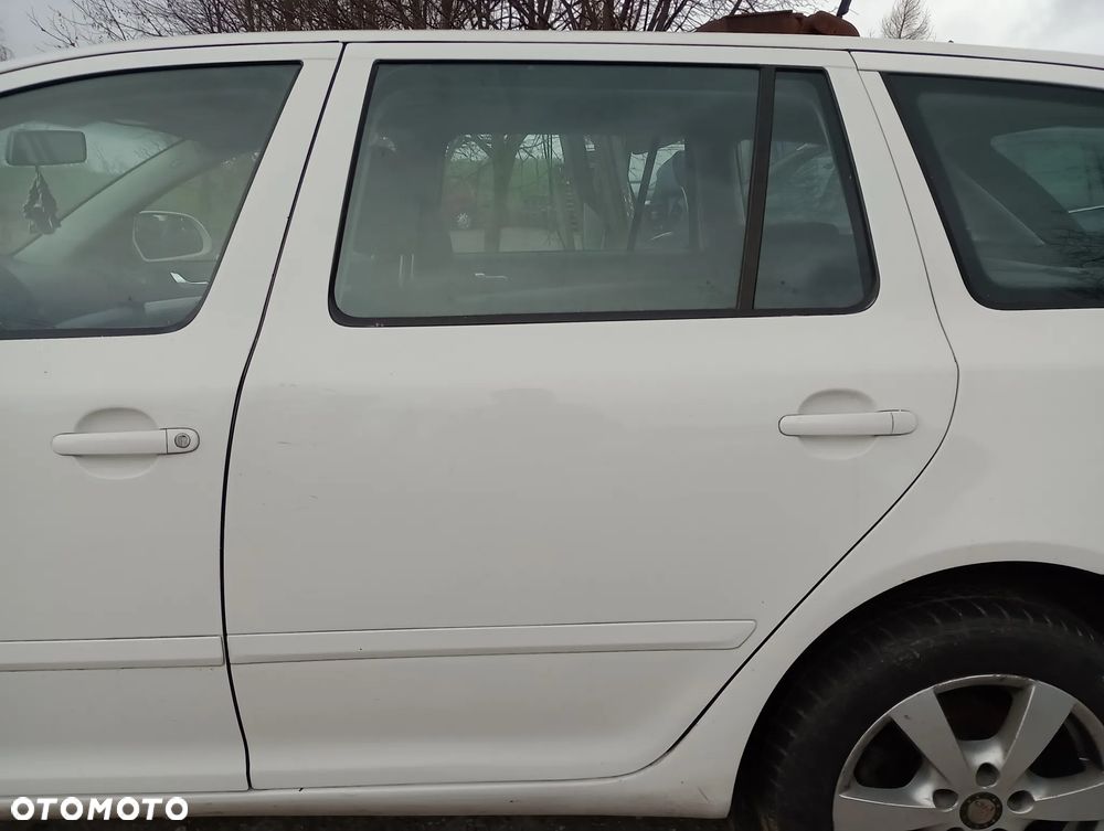 SKODA OCTAVIA II FL kombi drzwi lewe tylne lewy tył LF9E - 1
