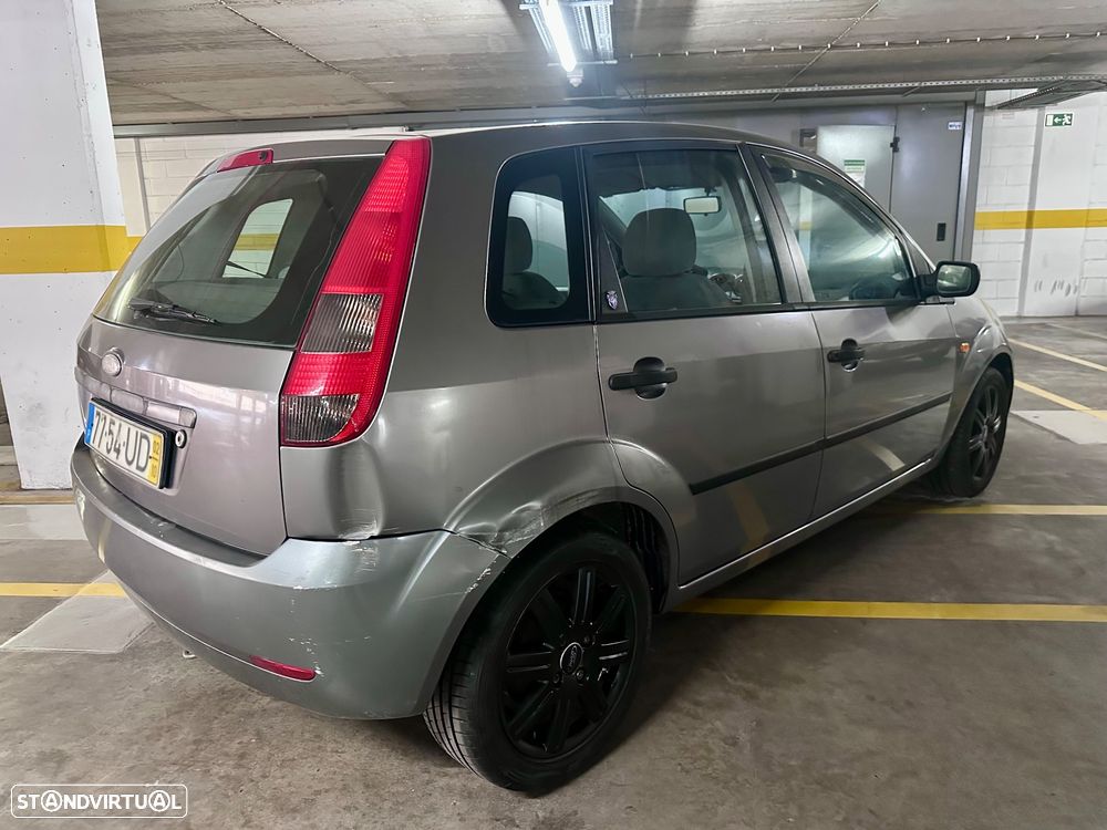 Ford Fiesta 1.4 Ghia - 13