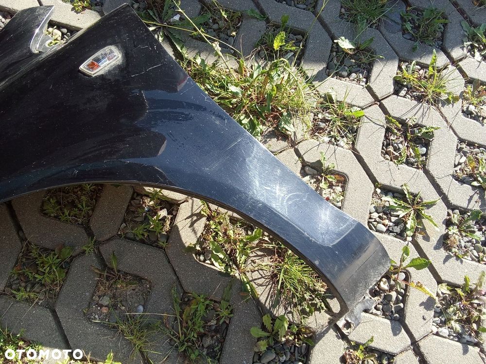 KL BŁOTNIK LEWY PRZÓD OPEL CORSA D 06- 5D - 2